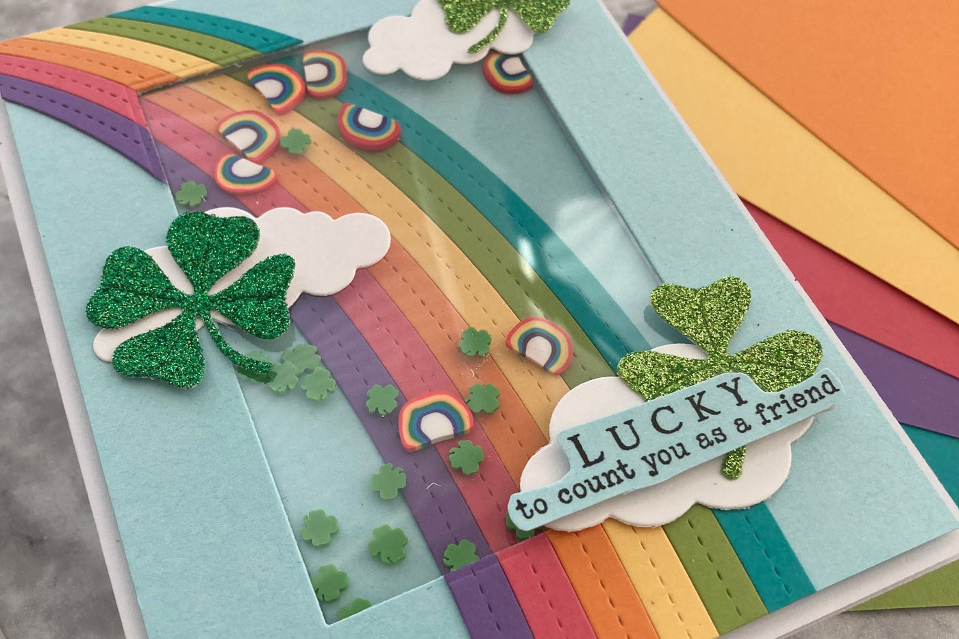 colorful shamrock St. Patrick's Day shaker card with rainbow die cut