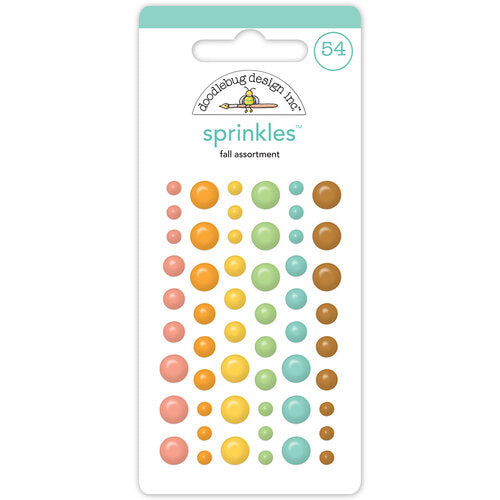 54-count self-adhesive enamel dots include pink, orange, lime green, aqua blue, and brown—a fun embellishment for craft projects by Doodlebug Design.