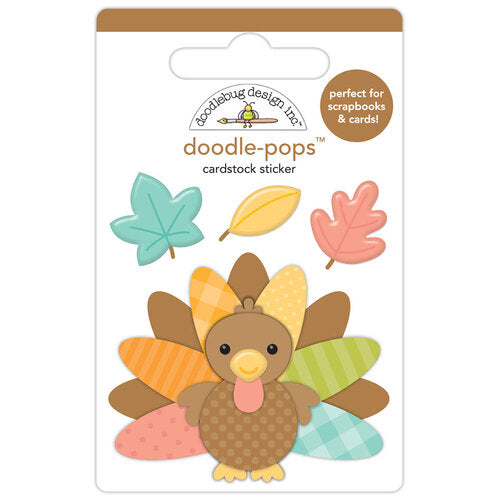  A turkey doodle-pops sticker with fall leaves, a fun embellishment for craft projects by Doodlebug Design.