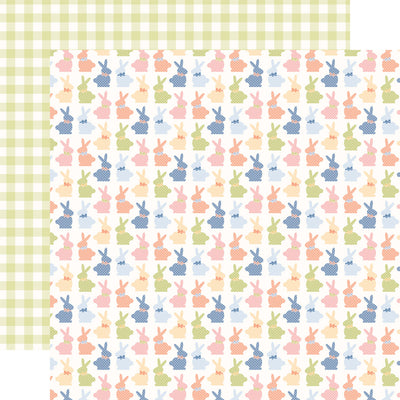 (Side A - a white background is covered with a repeating pattern of pastel-colored chocolate bunnies., Side B - features a classic gingham pattern in a soft, muted green color)