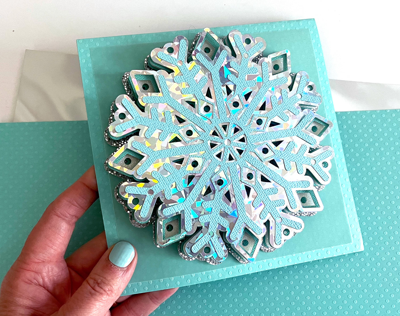 handmade holiday card featuring holographic cardstock