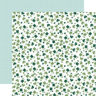 (Side A - a dense array of green four-leaf clovers scattered across a white background.; Side B - resembles graph paper with a light green background)