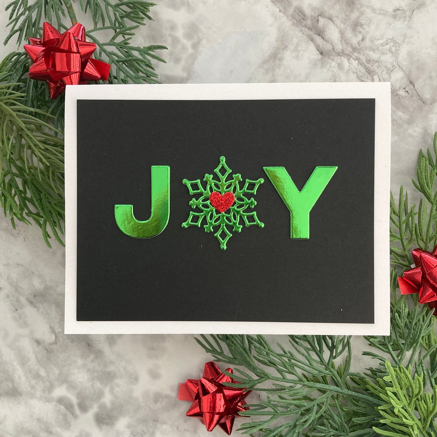 Handmade Christmas card featuring green foil cardstock