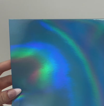 BLUE OCEAN HOLOGRAPHIC Iridescent Foil Cardstock - light blue - 12x12 - Encore Paper - video shows light play