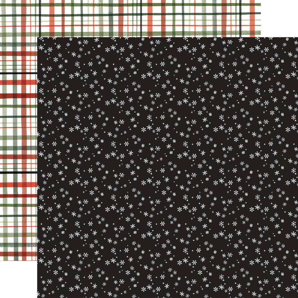 Double-sided 12x12 cardstock with tiny white snowflakes on a black background; the reverse is a red and green plaid on a white background.